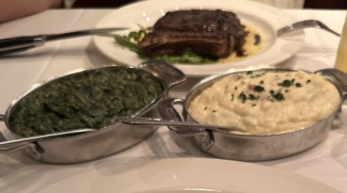 The Capital Grille signature dishes Dry Aged Ny Strip Steak Frites with Aji Verde
Creamed Spinach
Seared Tenderloin with Butter Poached Lobster Tails